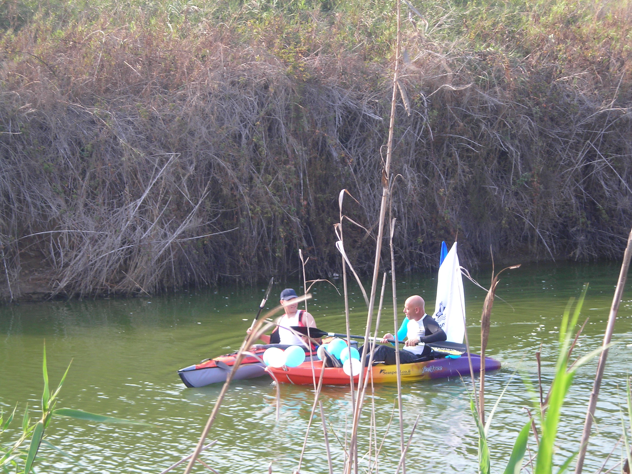 Zalul's Assistant Director, Ezer Fischler (L), kayaks in the Lachish River for the first time in decades with Adi Ben-Lish, Director of Park Lachish in Ashdod.